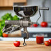 Fabio Leonardi manual tomato machine making sauce